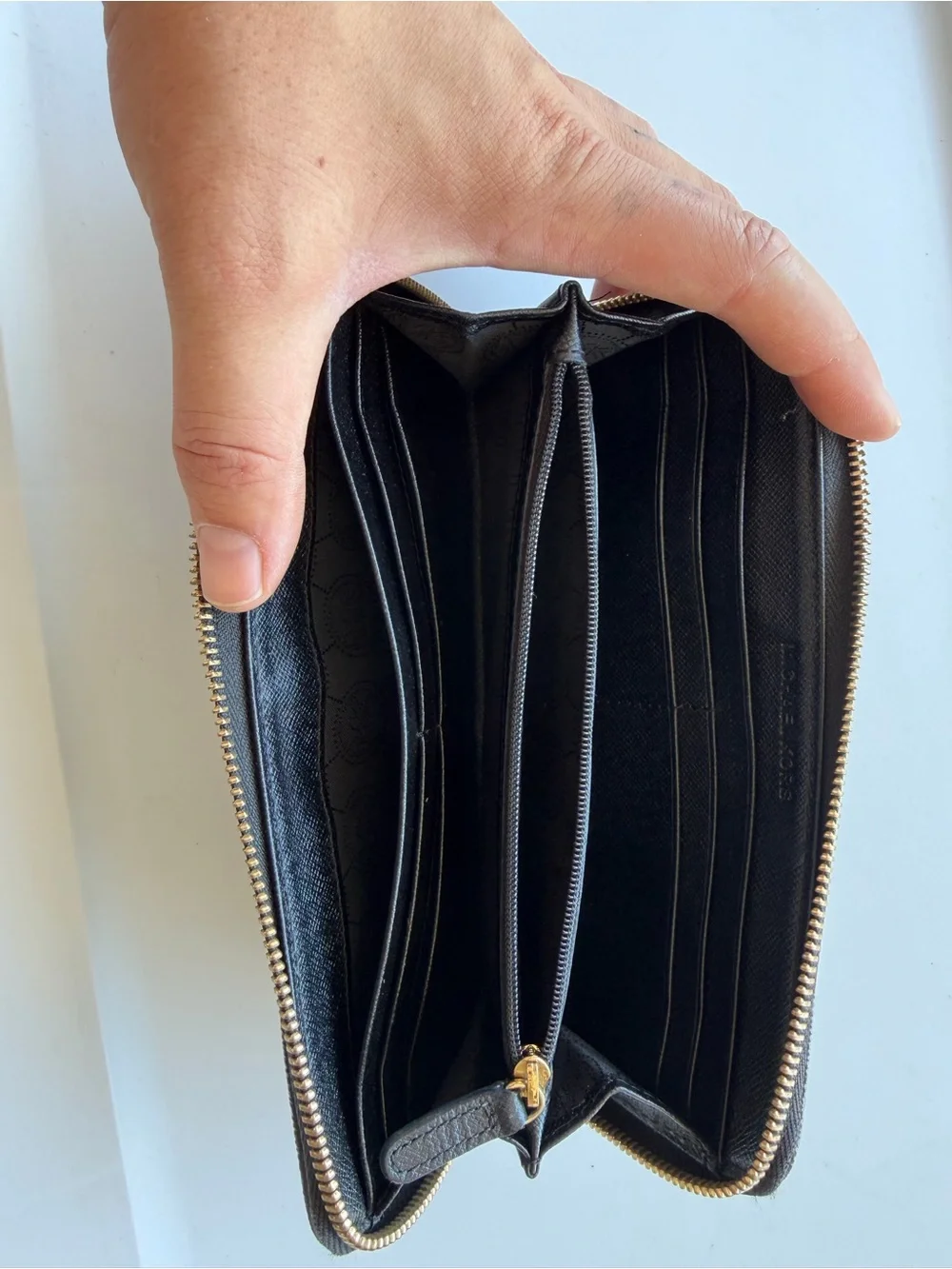 Michael Kors Black Zip Wallet with Gold Plate